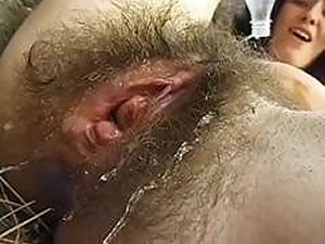 Wet hairy cunt close up